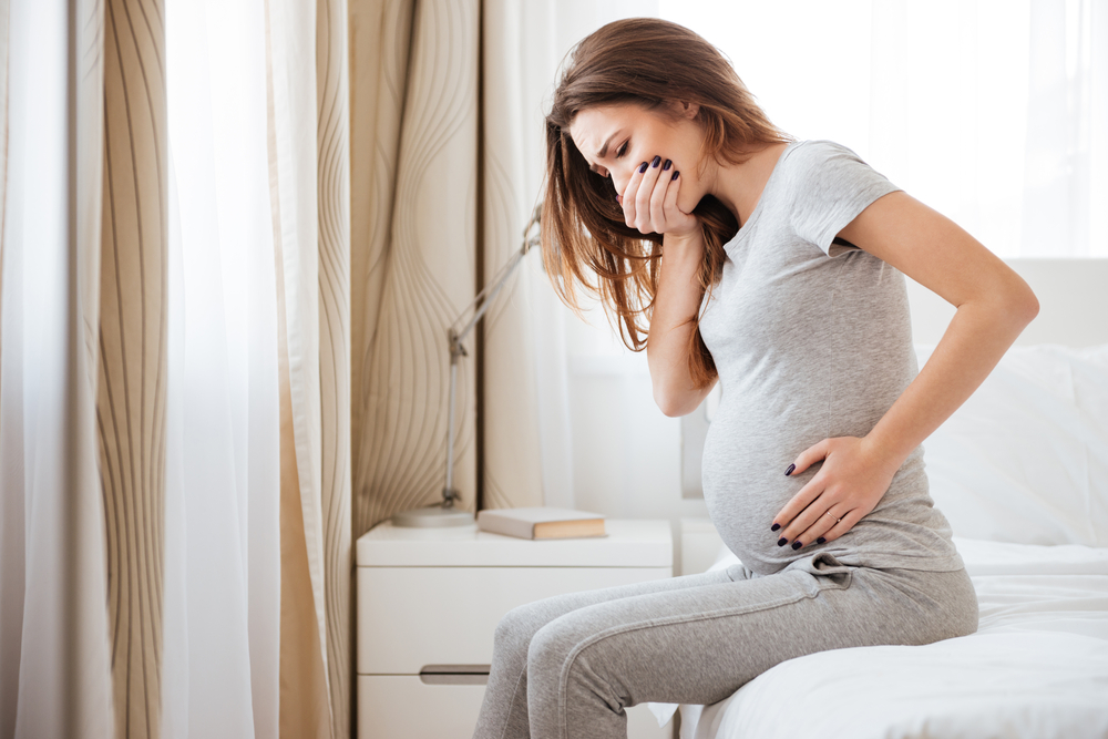 pregnant woman sick.