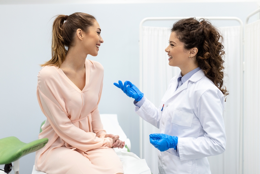 woman talking to doctor.